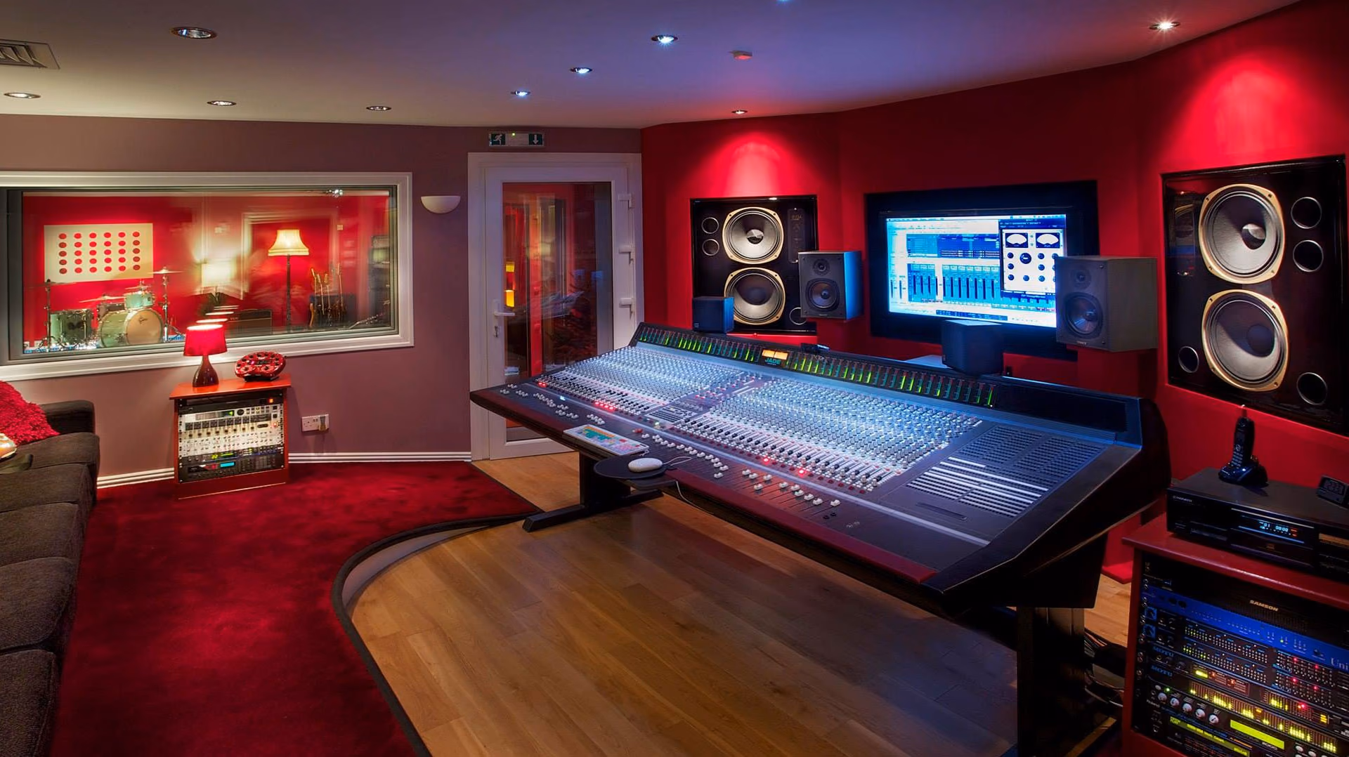 Recording studio control room with mixing console
