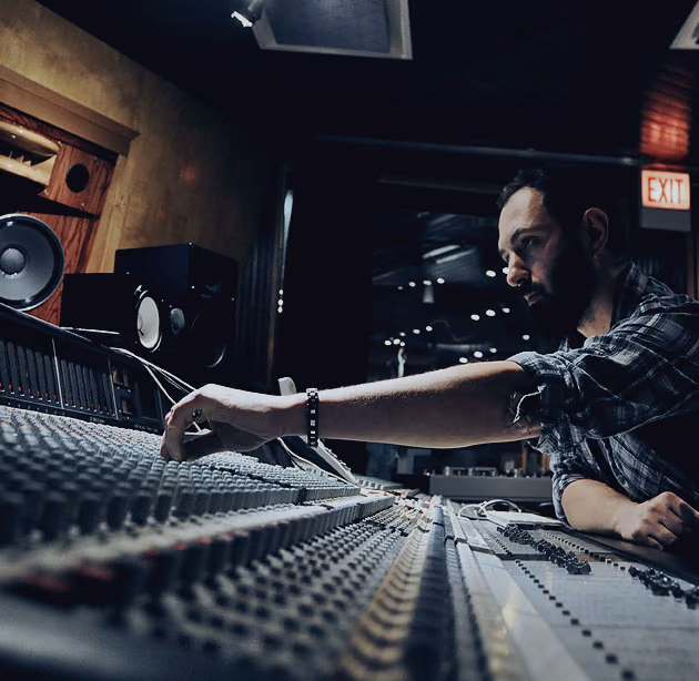 Sound engineer at a 5.1 mixing console