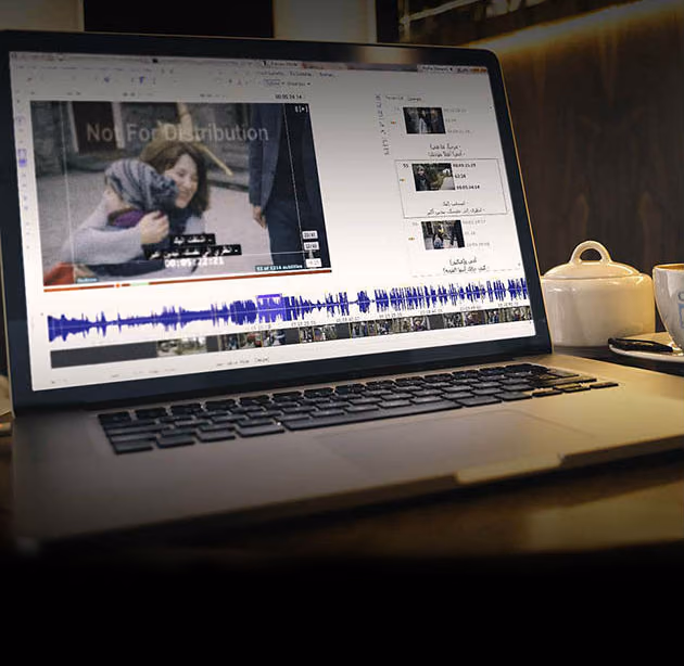 Laptop running subtitle editing software